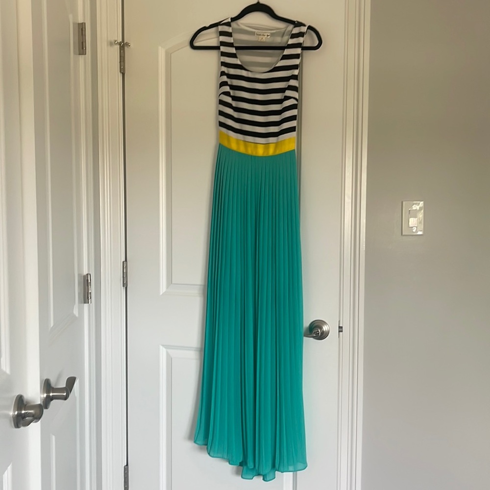 Long beautiful pleated dress with striped top.